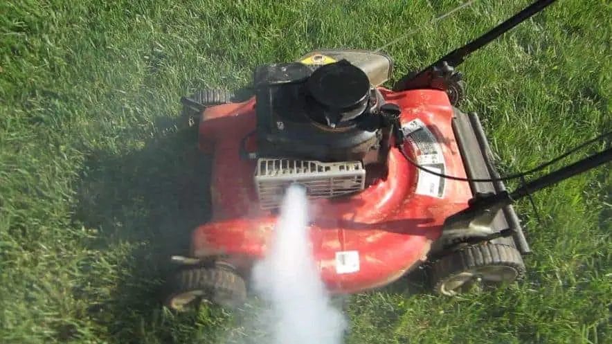 (image of a lawn mower engine smoking)